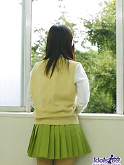 Asian slut dresses the part of a school girl and cleans up the class room